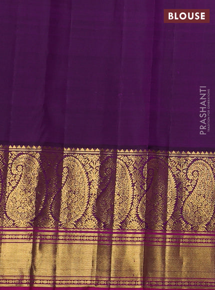 Pure kanchipuram silk saree pastel grey and purple with allover self emboss & zari buttas and long paisley zari woven korvai border
