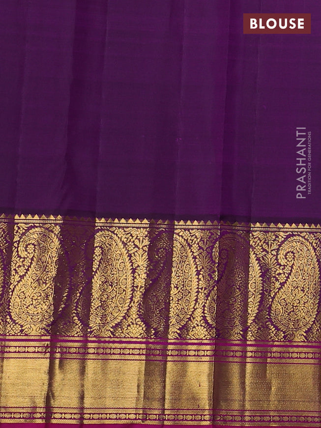 Pure kanchipuram silk saree pastel grey and purple with allover self emboss & zari buttas and long paisley zari woven korvai border
