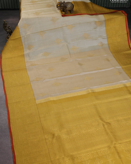 Pure kanchipuram silk saree cream and mustard yellow with zari woven buttas and long zari woven border