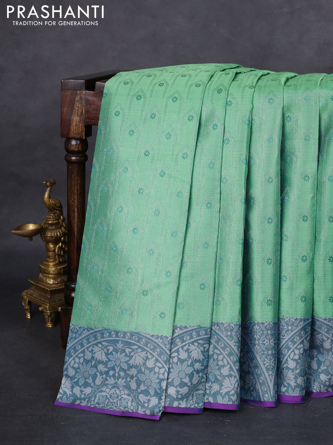 Pure kanchipuram silk saree teal shade and purple with allover silver zari weaves and rich zari woven border