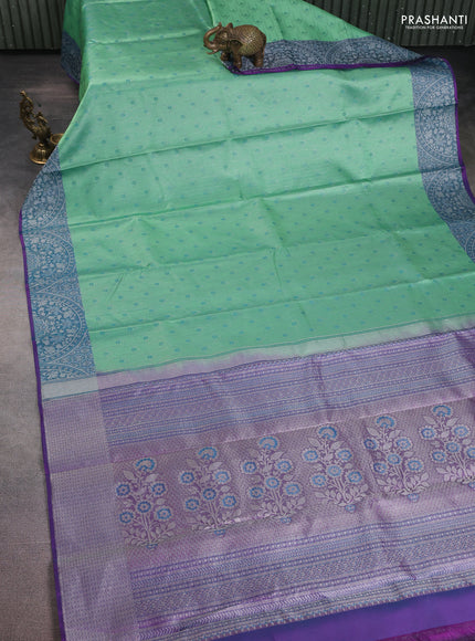 Pure kanchipuram silk saree teal shade and purple with allover silver zari weaves and rich zari woven border