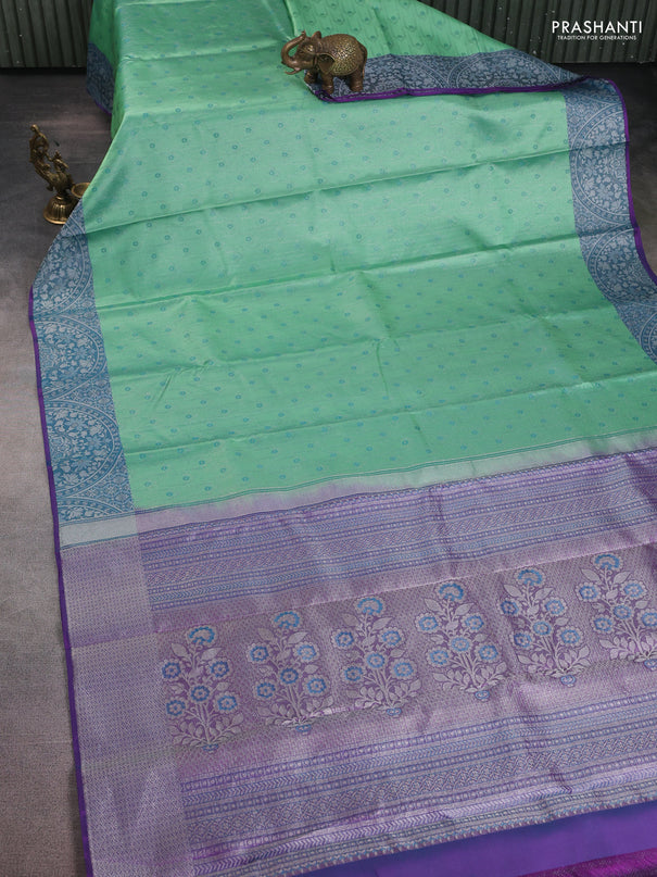 Pure kanchipuram silk saree teal shade and purple with allover silver zari weaves and rich zari woven border