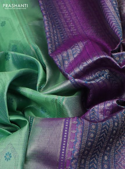 Pure kanchipuram silk saree teal shade and purple with allover silver zari weaves and rich zari woven border