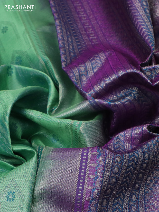 Pure kanchipuram silk saree teal shade and purple with allover silver zari weaves and rich zari woven border