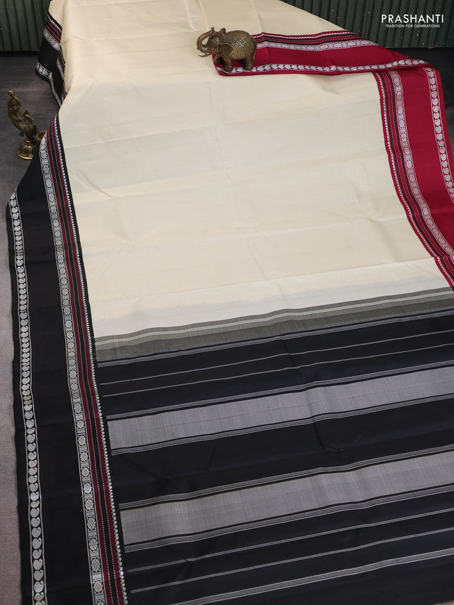 Pure kanchipuram silk saree cream with plain body and ganga jamuna border