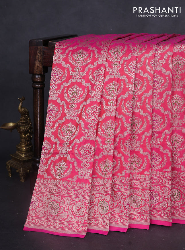 Banarasi uppada silk saree dual shade of pinkish orange with allover zari woven brocade weaves and zari woven border
