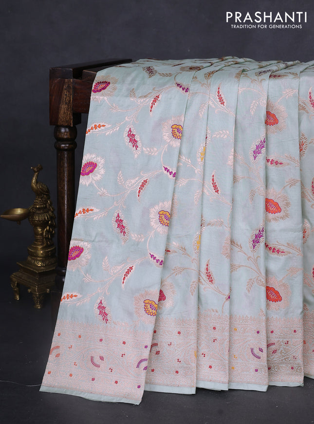 Banarasi uppada silk saree pastel green shade with allover zari woven floral brocade weaves and zari woven border