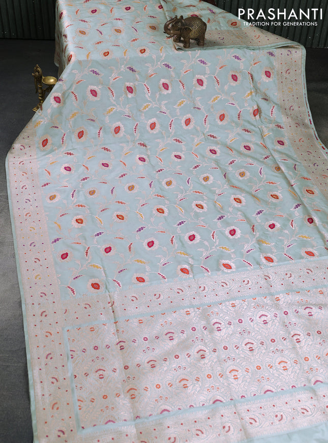 Banarasi uppada silk saree pastel green shade with allover zari woven floral brocade weaves and zari woven border