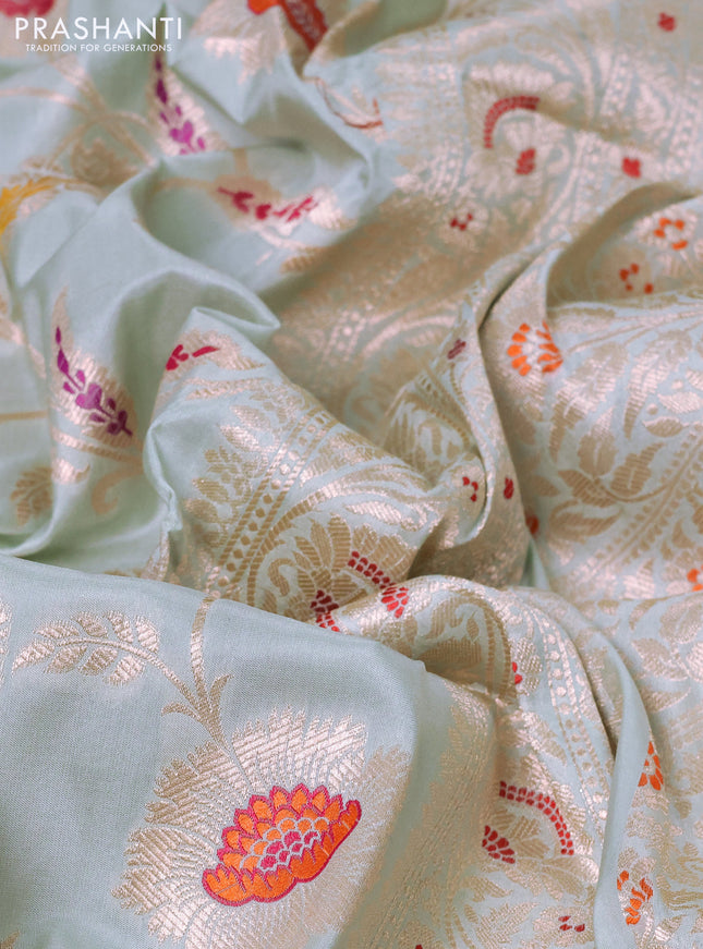 Banarasi uppada silk saree pastel green shade with allover zari woven floral brocade weaves and zari woven border