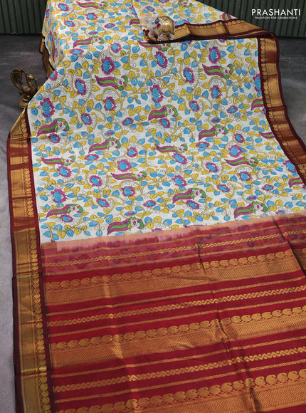Silk cotton saree cream and maroon with allover kalamkari prints and zari woven korvai border