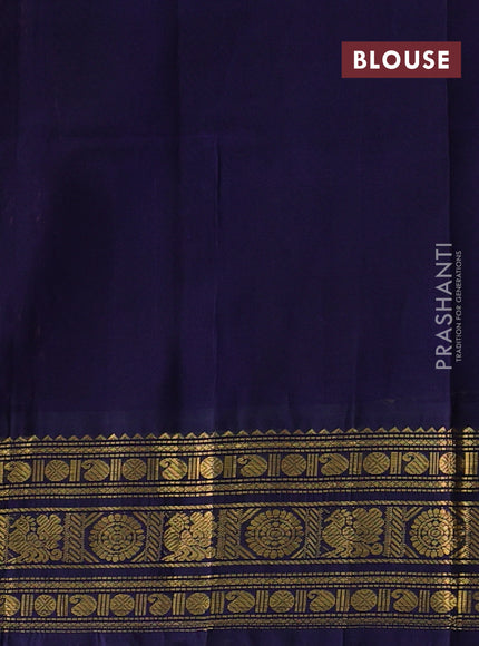 Silk cotton saree peach shade and navy blue with allover kalamkari prints and zari woven korvai border