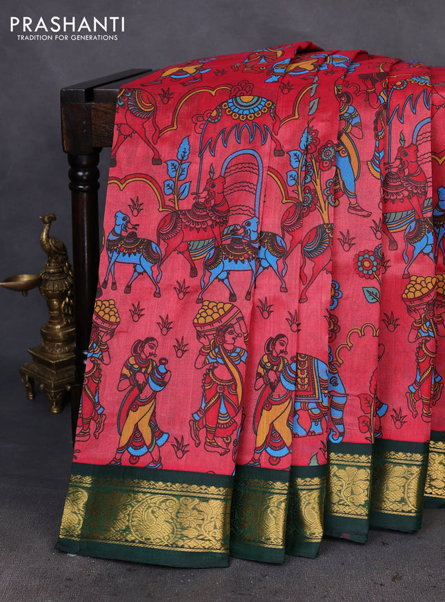 Silk cotton saree peach red and bottle green with allover kalamkari prints and zari woven korvai border