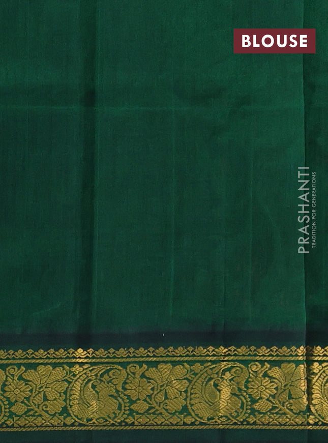 Silk cotton saree peach red and bottle green with allover kalamkari prints and zari woven korvai border