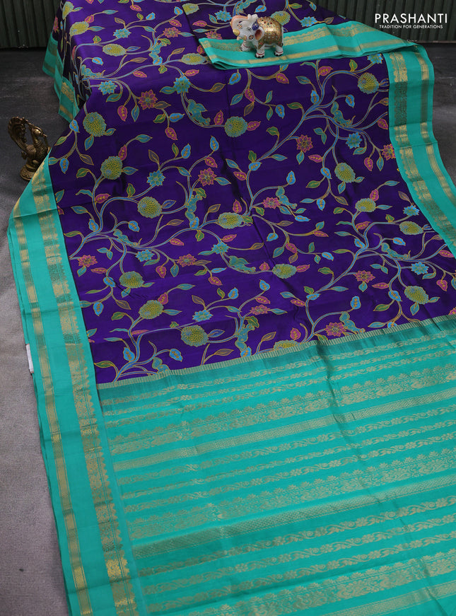 Silk cotton saree blue and teal green with allover kalamkari prints and rettapet zari woven korvai border