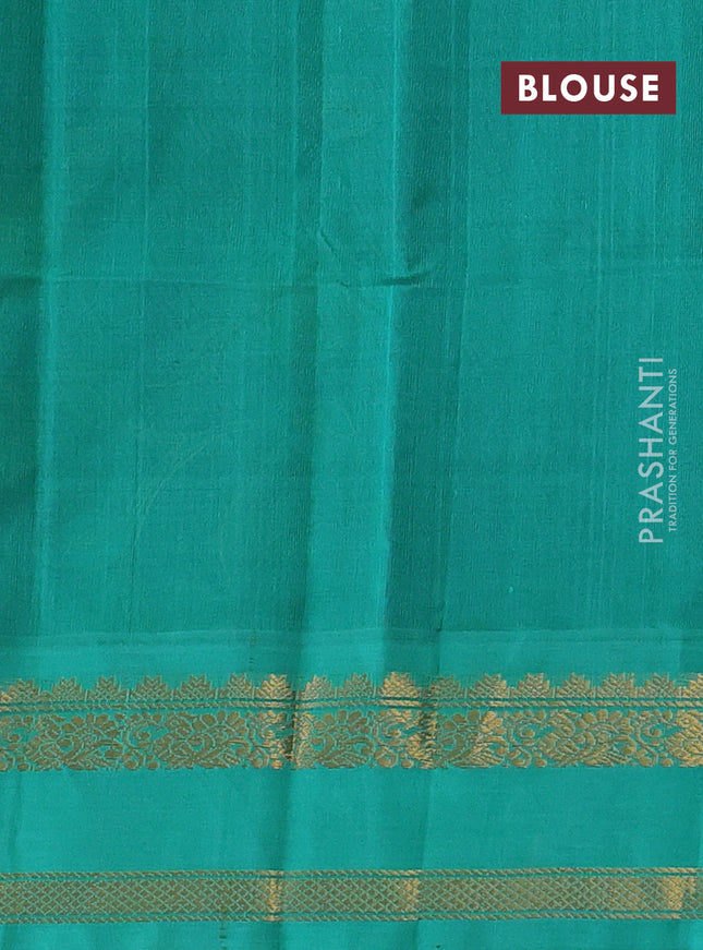 Silk cotton saree blue and teal green with allover kalamkari prints and rettapet zari woven korvai border
