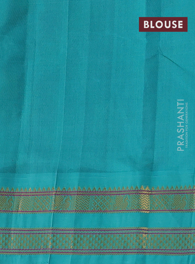 Silk cotton saree purple and teal blue with allover kalamkari prints and rettapet zari woven korvai border