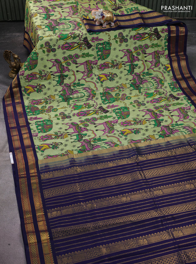 Silk cotton saree pista green and navy blue with allover kalamkari prints and rettapet zari woven korvai border