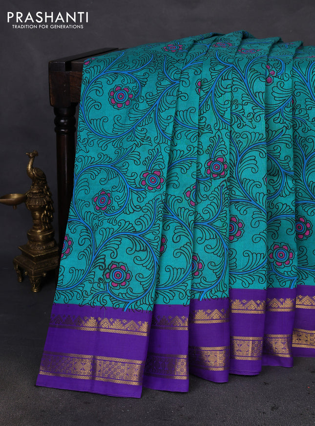 Silk cotton saree teal blue and violet with allover kalamkari prints and rettapet zari woven korvai border