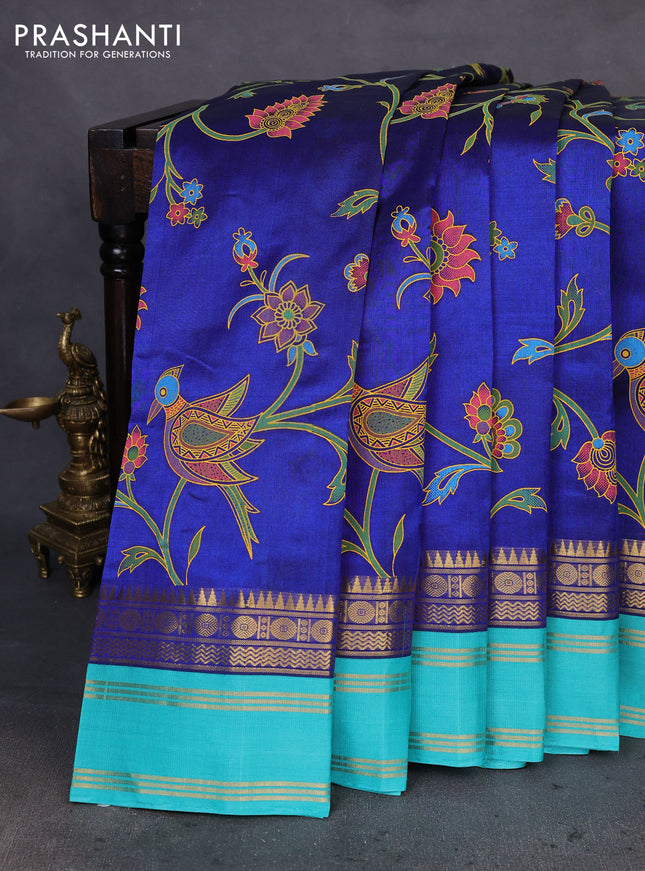 Silk cotton saree blue and teal green with allover kalamkari prints and rettapet zari woven border