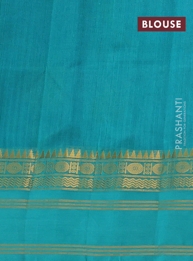 Silk cotton saree blue and teal green with allover kalamkari prints and rettapet zari woven border