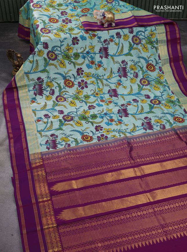 Silk cotton saree teal shade and purple with allover kalamkari prints and rettapet zari woven border