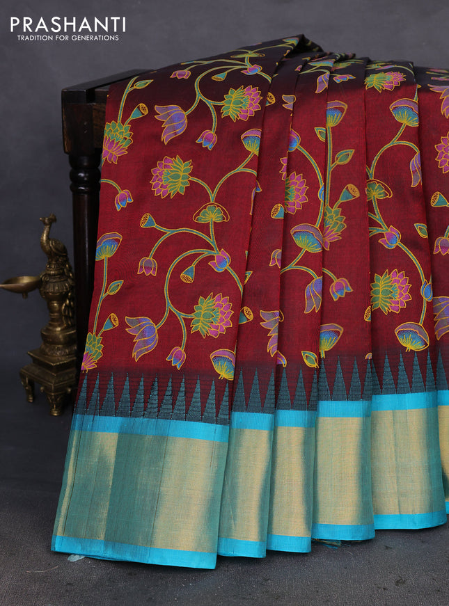 Silk cotton saree maroon and teal blue with allover pichwai prints and temple design zari woven border