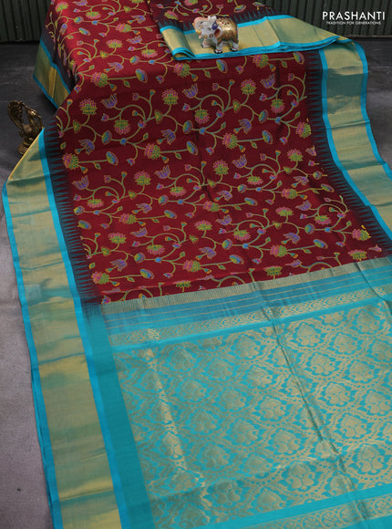 Silk cotton saree maroon and teal blue with allover pichwai prints and temple design zari woven border