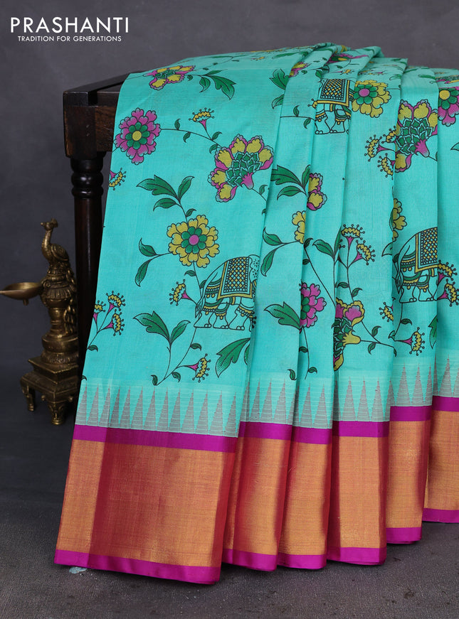 Silk cotton saree teal green and purple with allover kalamkari prints and temple design zari woven border