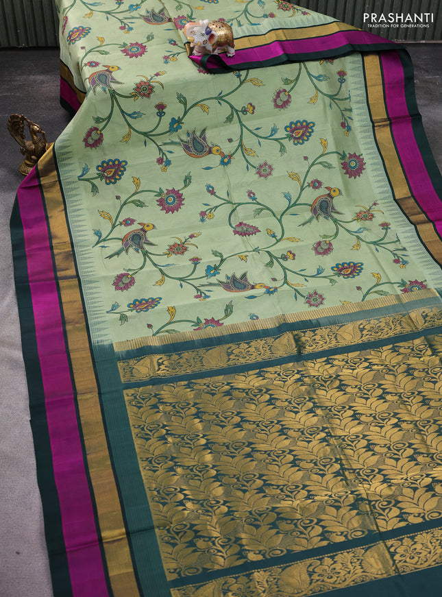 Silk cotton saree pastel green and dark green with allover kalamkari prints and temple design zari woven simple border