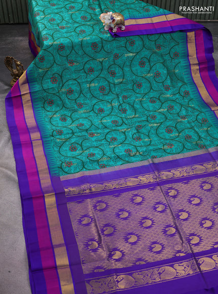 Silk cotton saree teal green and violet with allover kalamkari prints and temple design zari woven simple border