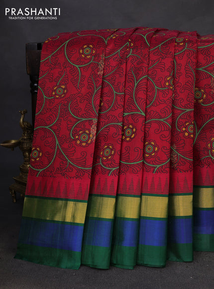 Silk cotton saree red and dark green with allover kalamkari prints and temple design zari woven simple border