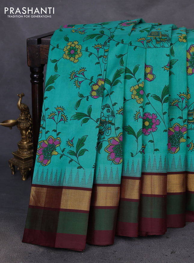 Silk cotton saree teal blue and deep maroon with allover kalamkari prints and temple design zari woven simple border