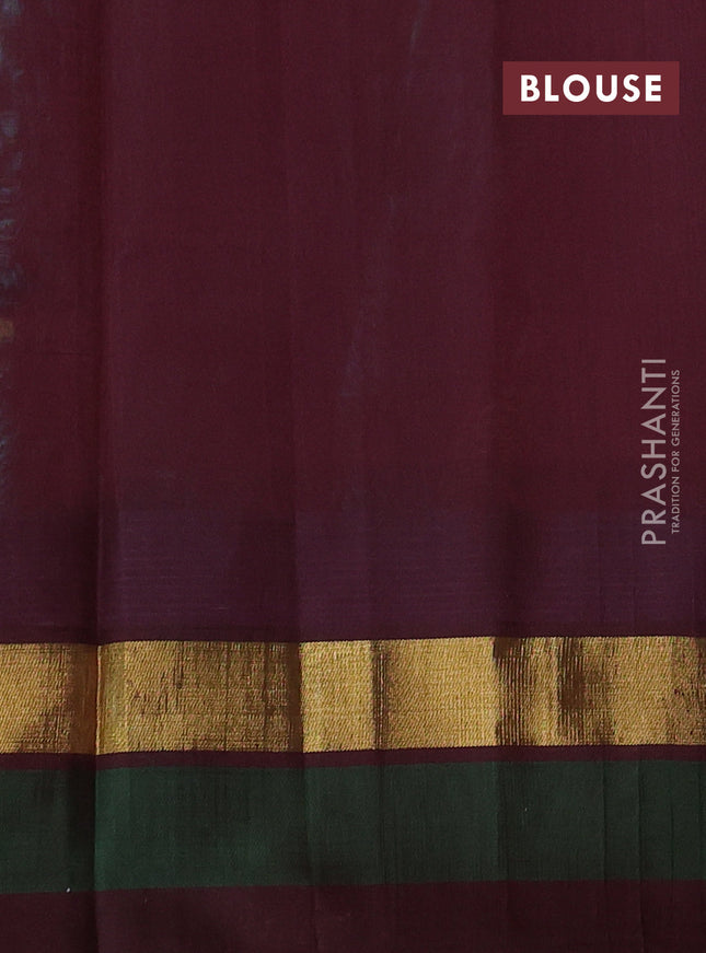 Silk cotton saree teal blue and deep maroon with allover kalamkari prints and temple design zari woven simple border