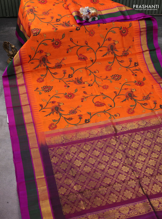 Silk cotton saree orange and purple with allover kalamkari prints and temple design zari woven simple border