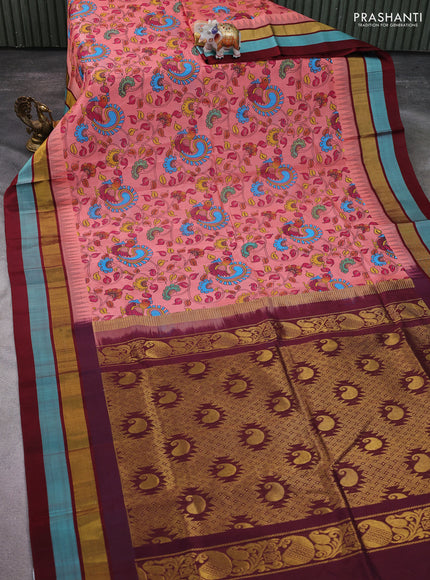 Silk cotton saree peach shade and maroon with allover kalamkari prints and temple design zari woven simple border