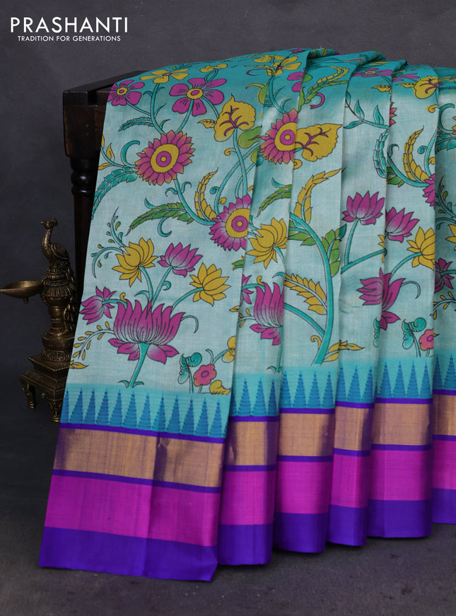 Silk cotton saree teal green and violet with allover kalamkari prints and temple design zari woven simple border