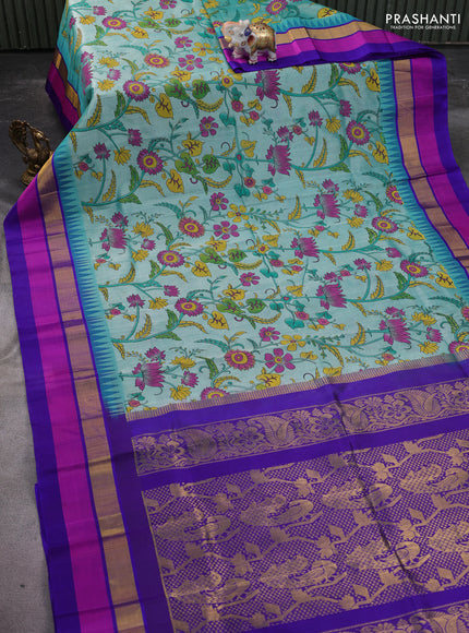 Silk cotton saree teal green and violet with allover kalamkari prints and temple design zari woven simple border