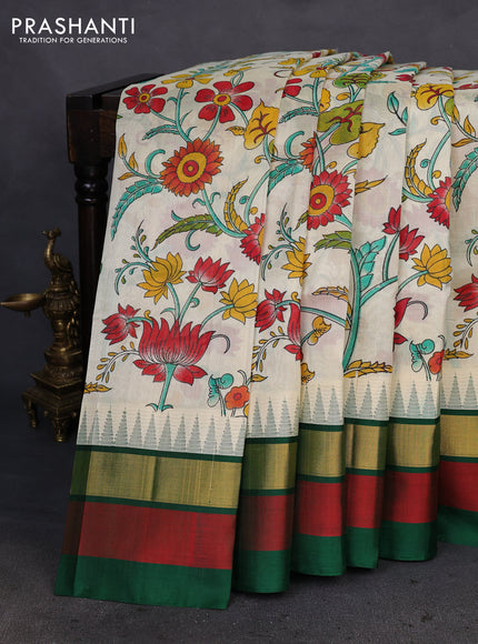 Silk cotton saree cream and green with allover kalamkari prints and temple design zari woven simple border