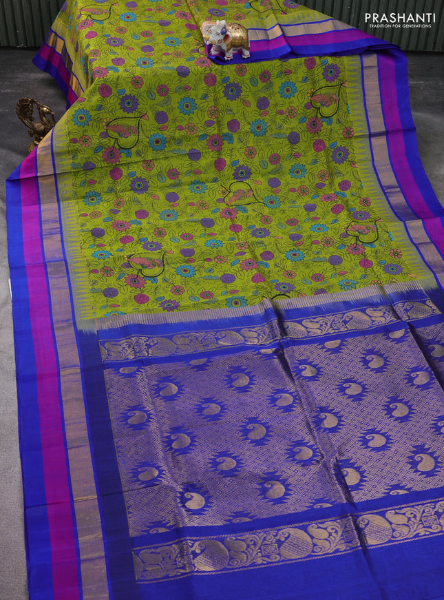 Silk cotton saree light green and blue with allover kalamkari prints and temple design zari woven simple border