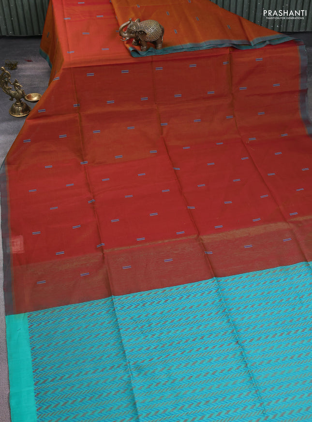 Kora silk cotton saree dual shade of honey and teal green with thread woven buttas and simple border