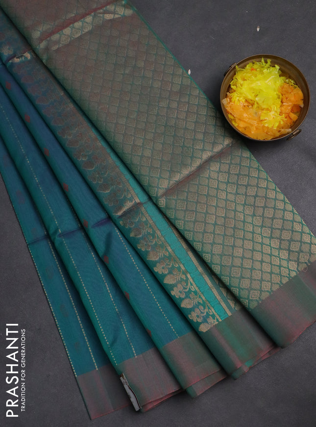 Kora silk cotton saree dual shade of teal blueish green and dual shade of greenish pink with allover zari weaves & thread buttas and simple border