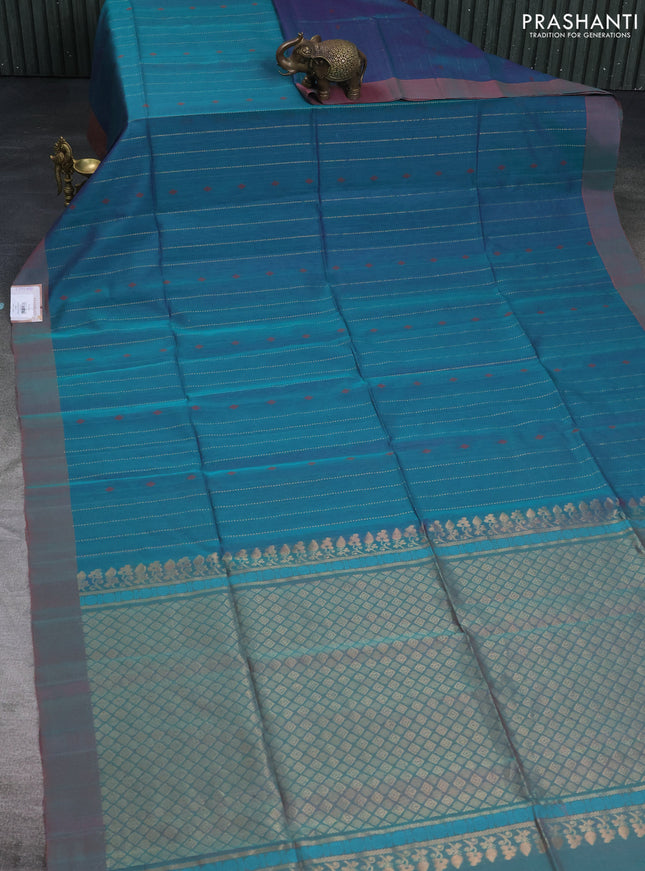 Kora silk cotton saree dual shade of teal blueish green and dual shade of greenish pink with allover zari weaves & thread buttas and simple border
