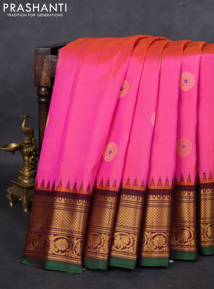 Pure gadwal silk saree dual shade of pinkish orange and deep maroon with zari woven buttas and temple design zari woven border
