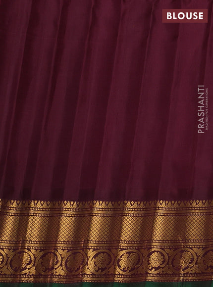 Pure gadwal silk saree dual shade of pinkish orange and deep maroon with zari woven buttas and temple design zari woven border