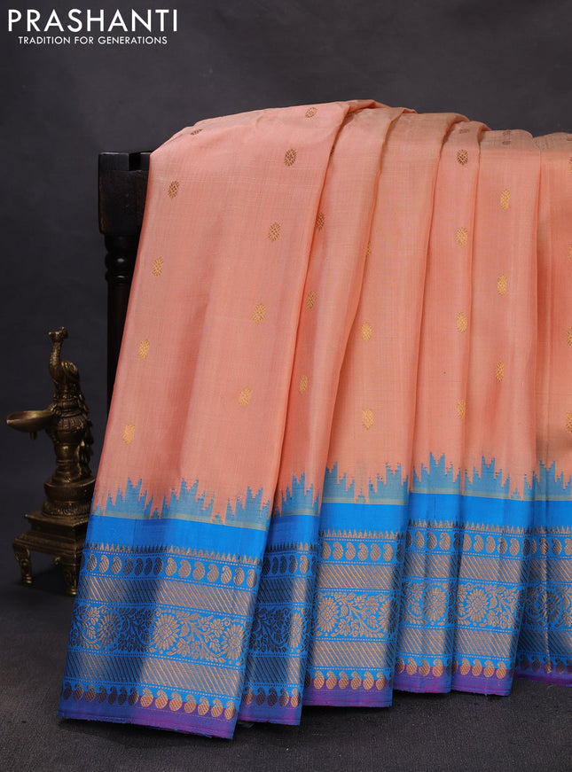 Pure gadwal silk saree peach orange and cs blue with zari woven buttas and temple design zari woven border