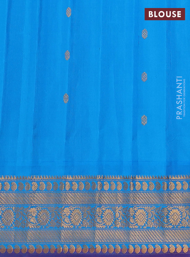 Pure gadwal silk saree peach orange and cs blue with zari woven buttas and temple design zari woven border