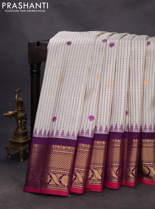 Pure gadwal silk saree cream and purple with allover checks & buttas and temple design zari woven border