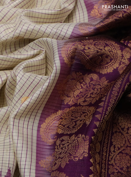 Pure gadwal silk saree cream and purple with allover checks & buttas and temple design zari woven border