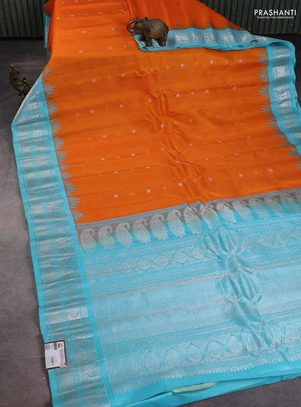 Pure gadwal silk saree orange and light blue with silver & gold zari woven buttas and temple design silver zari woven border