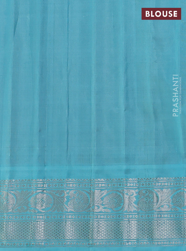 Pure gadwal silk saree orange and light blue with silver & gold zari woven buttas and temple design silver zari woven border